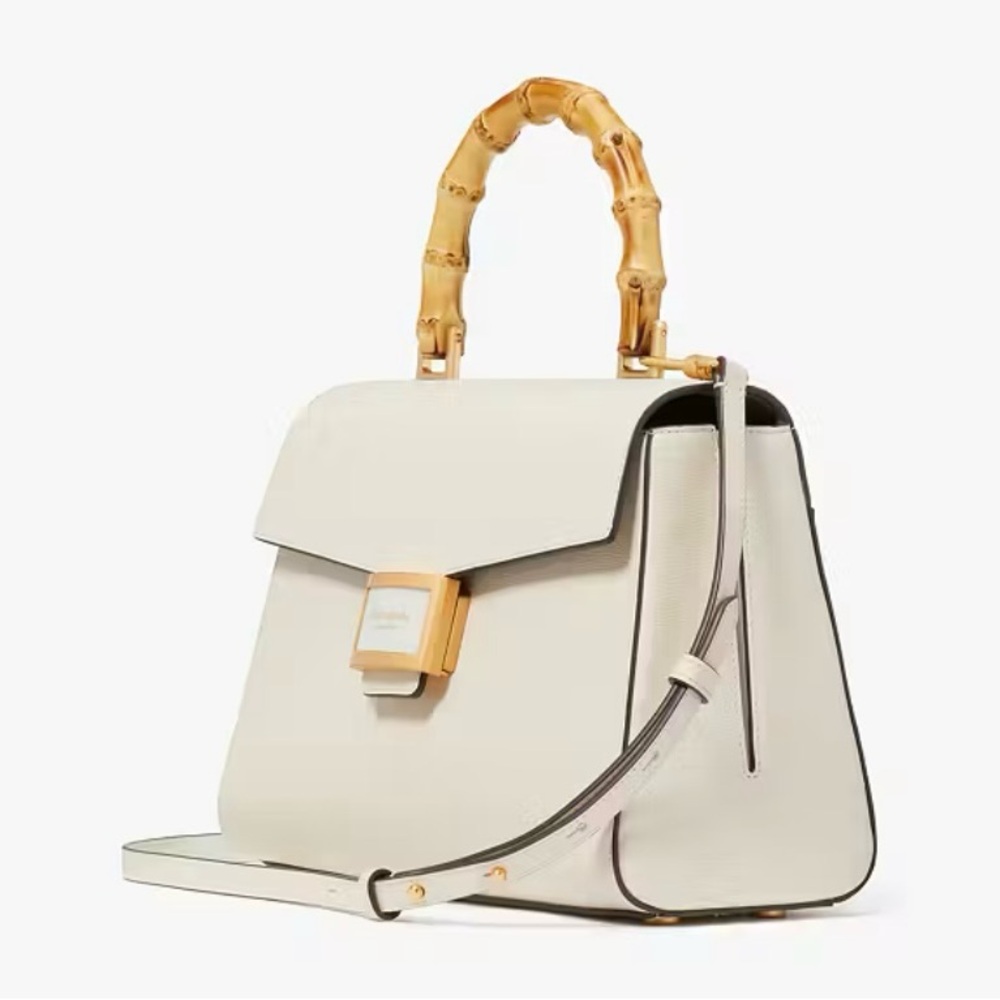 Kate Spade textured leather bamboo medium top handled bag.